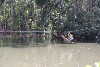 Photo of a person on the zip line at Ekukhanyeni